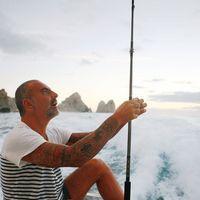 Christian Audigier catches a huge fish with his girlfriend Nathalie Sorensen | Picture 124263